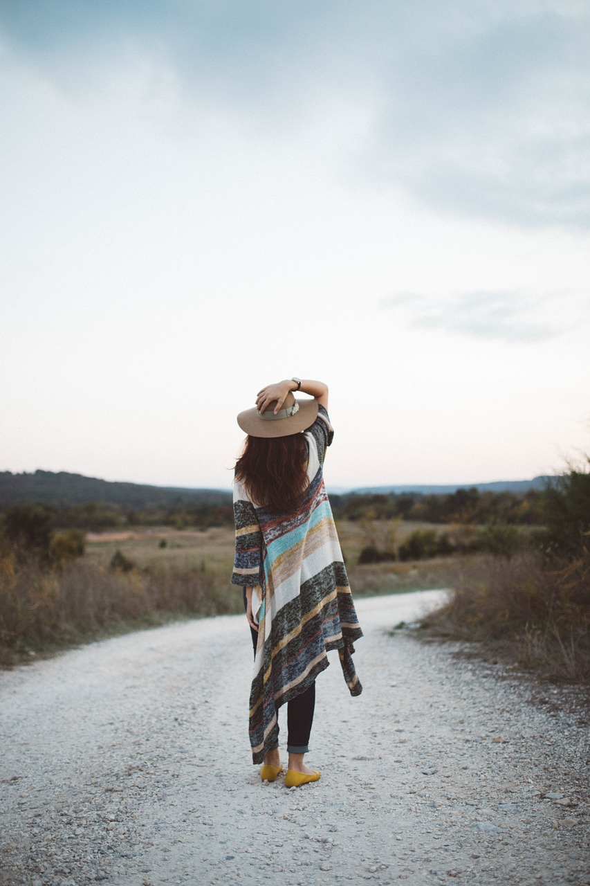 Image - woman outdoors back hat fashion
