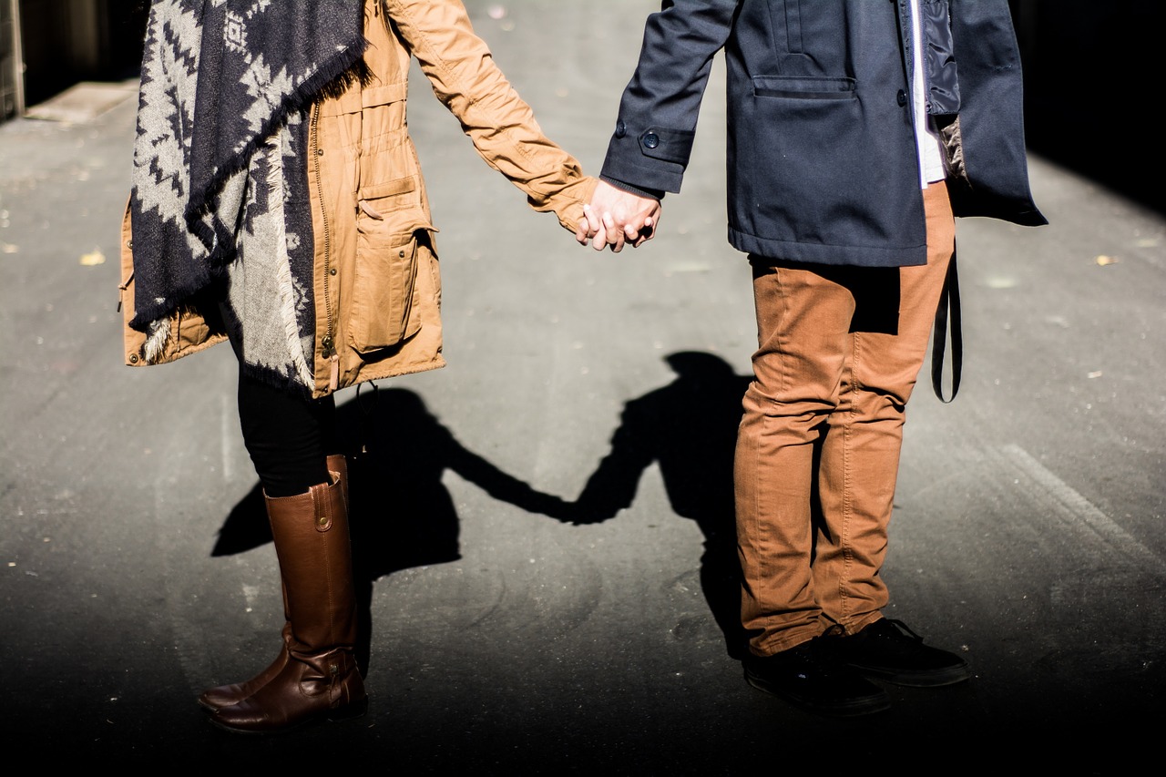 Image - holding hands couple man woman