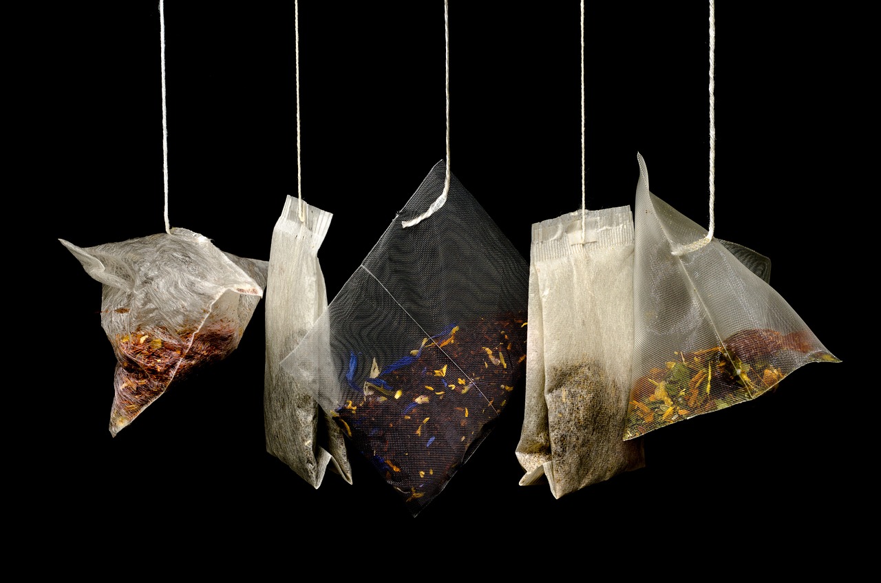 Image - tea teabags black background macro