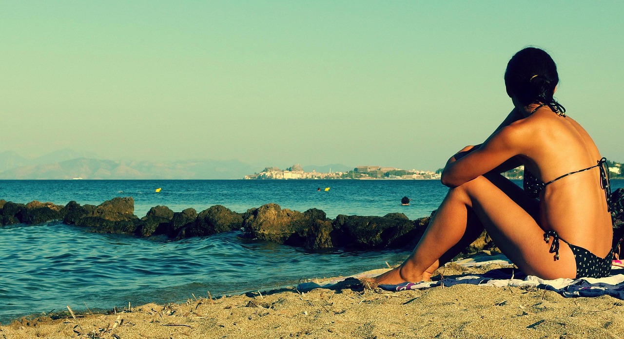 Image - young woman beach summer sunbathing