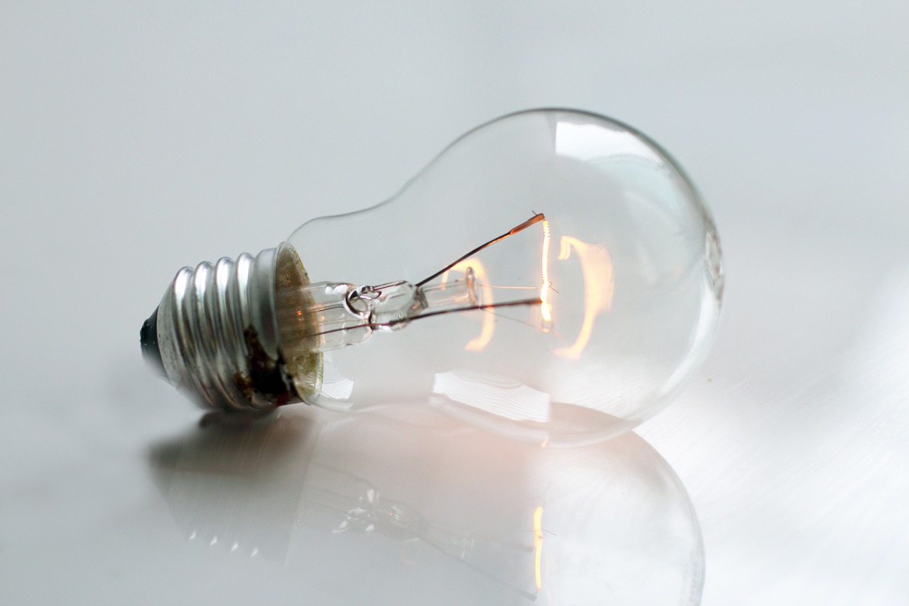 Image - close up glowing light bulb bright