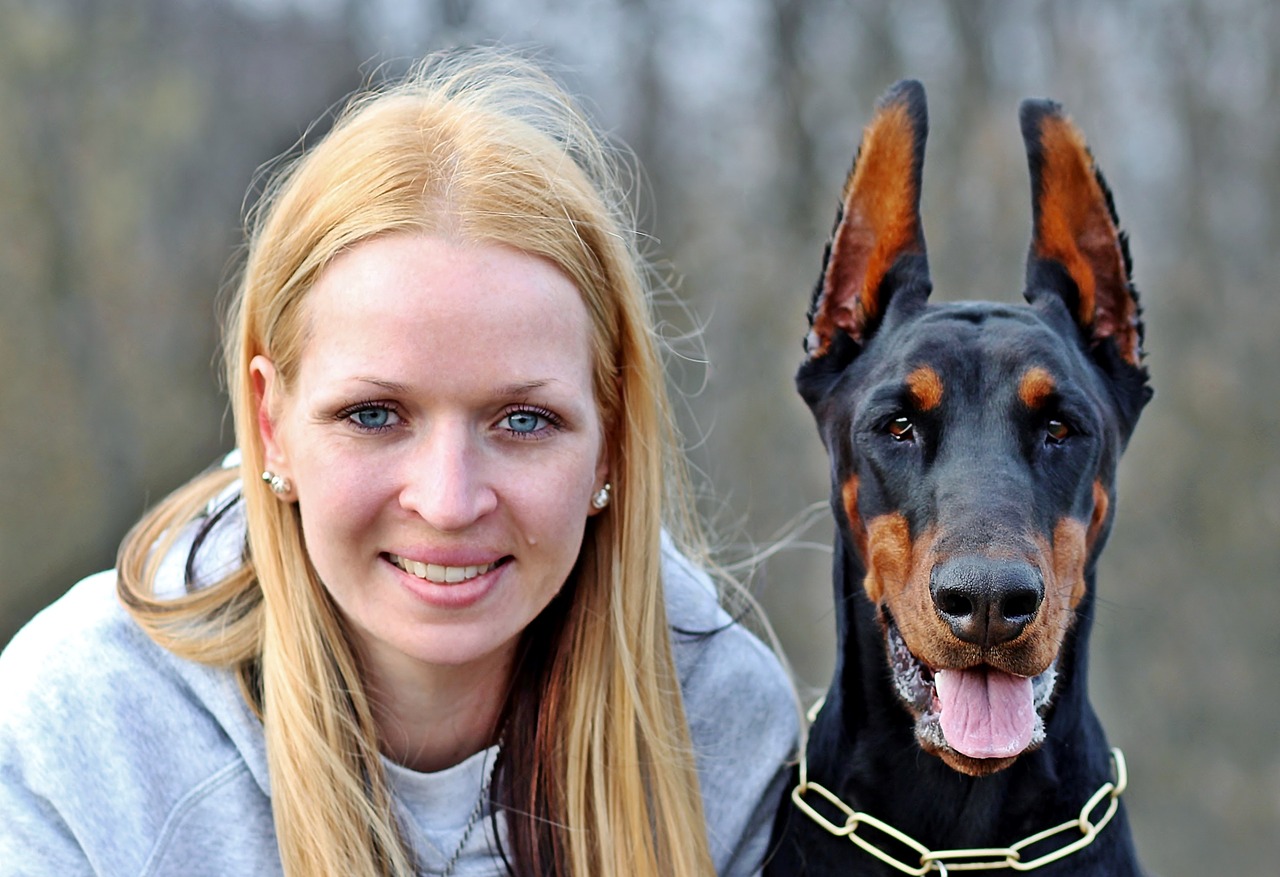 Image - blonde woman woman and dog doberman