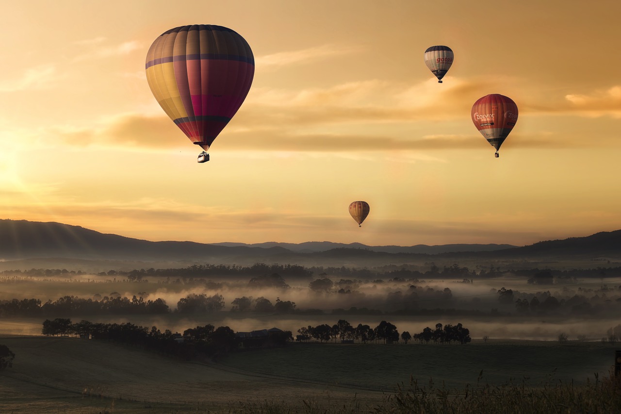 Image - hot air balloon valley sky yellow