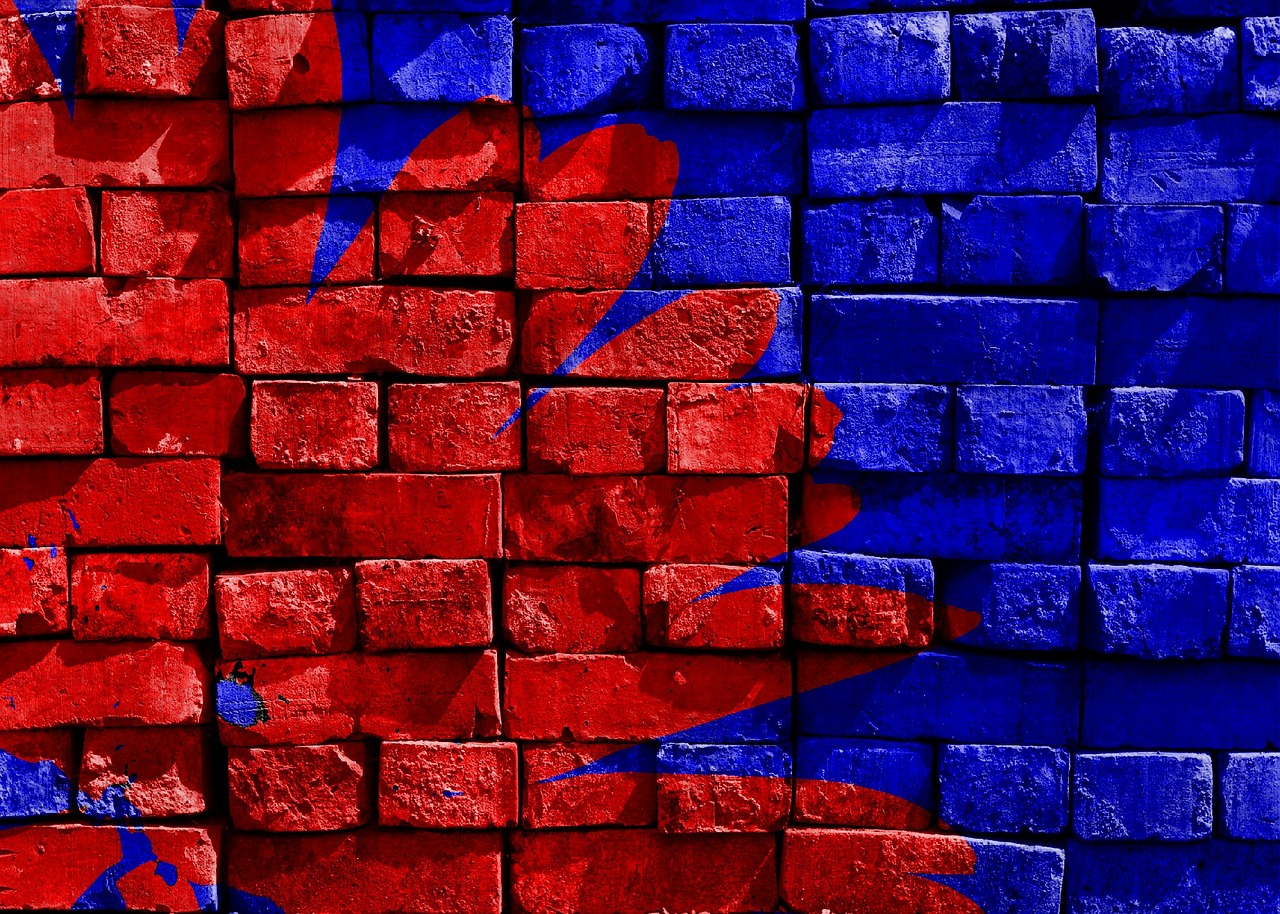 Image - blue red painted brick wall