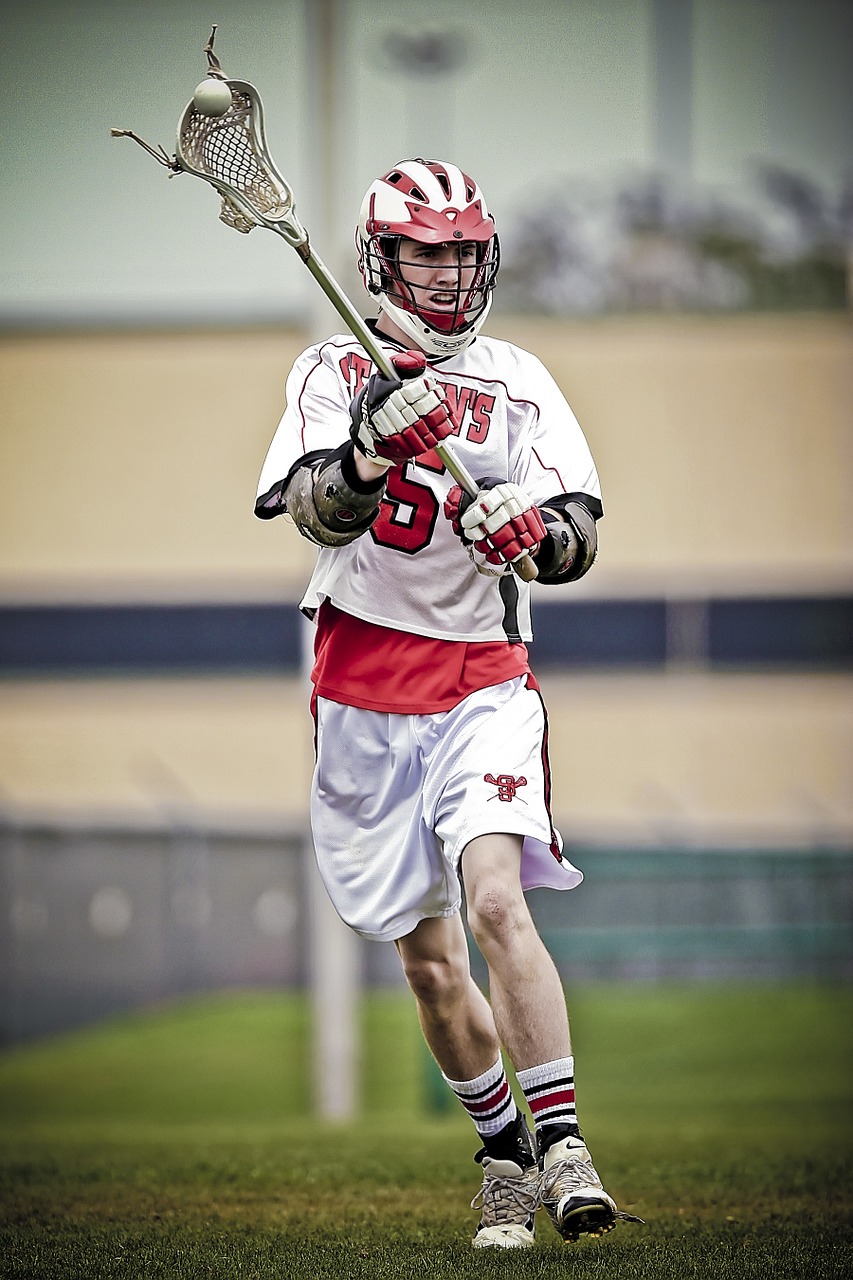 Image - lacrosse player stick ball action