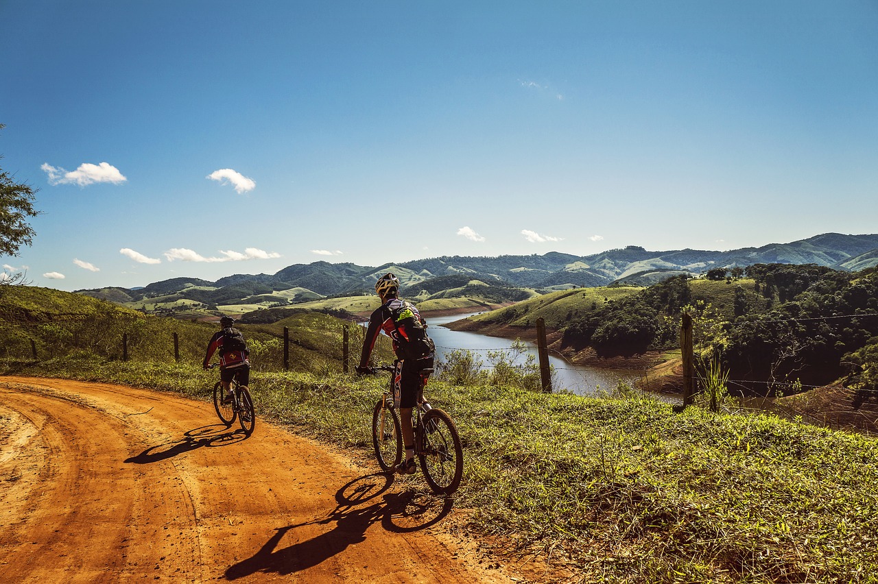 Image - cyclists trail bike clouds nature