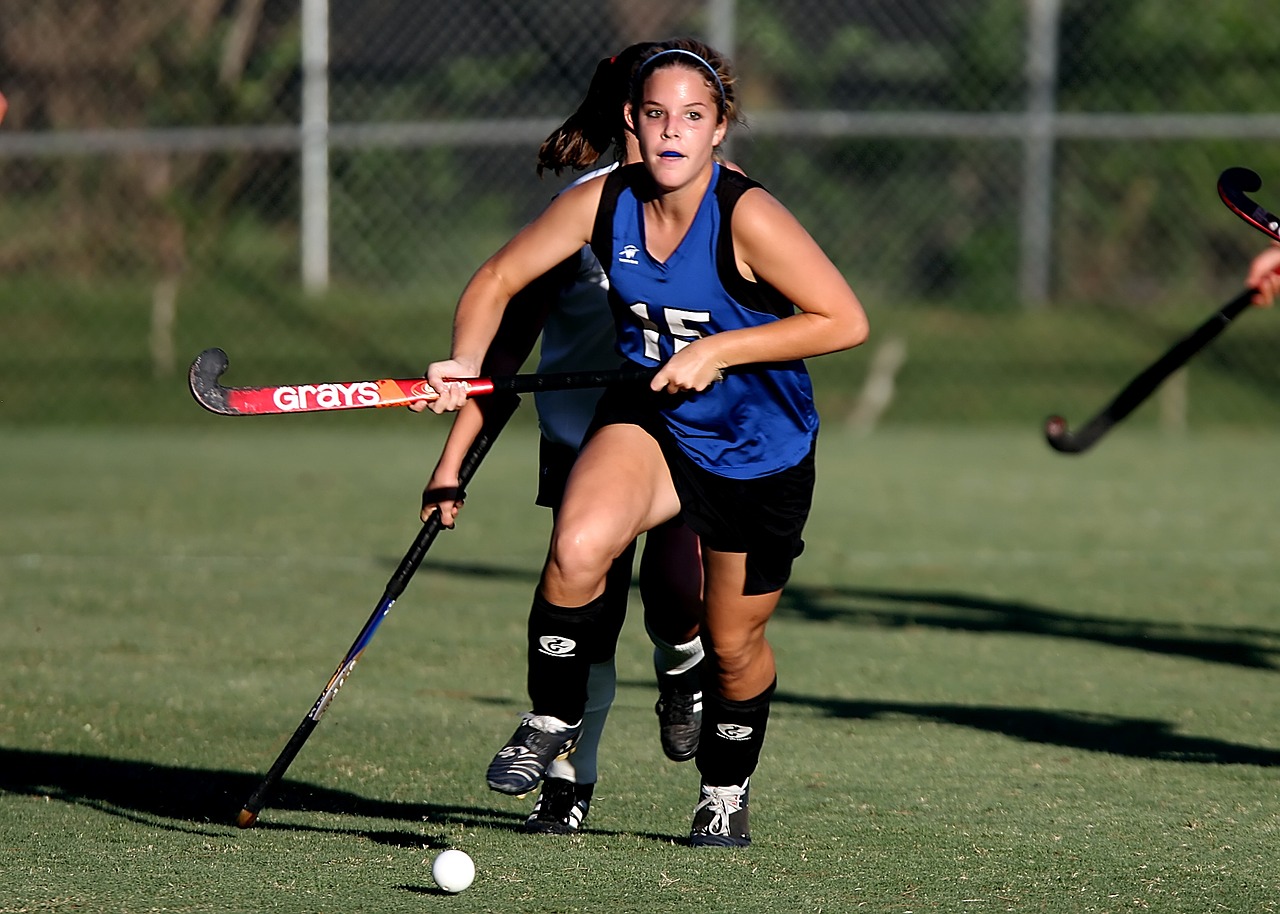 Image - field hockey game action girls