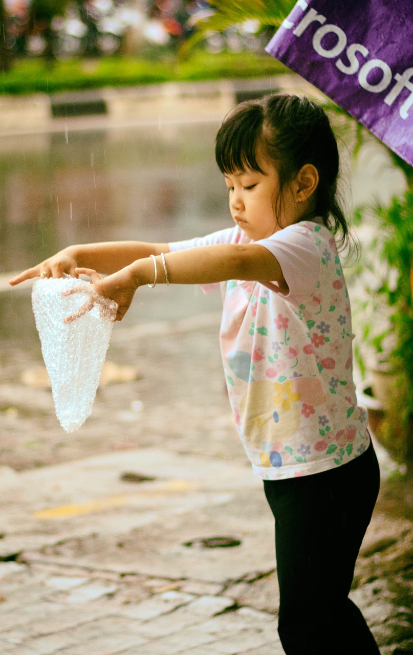 Image - little girl kid rain playing happy