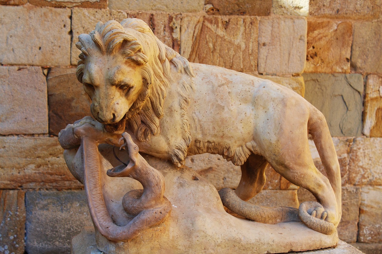 Image - statue stone statue lion snake