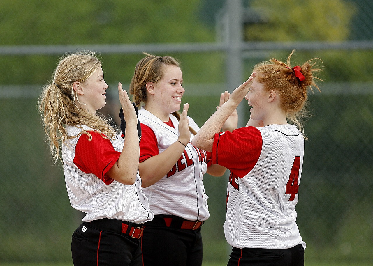 Image - softball girls team mates happy