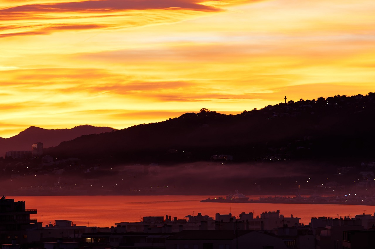 Image - sunset sky colorful hills ocean