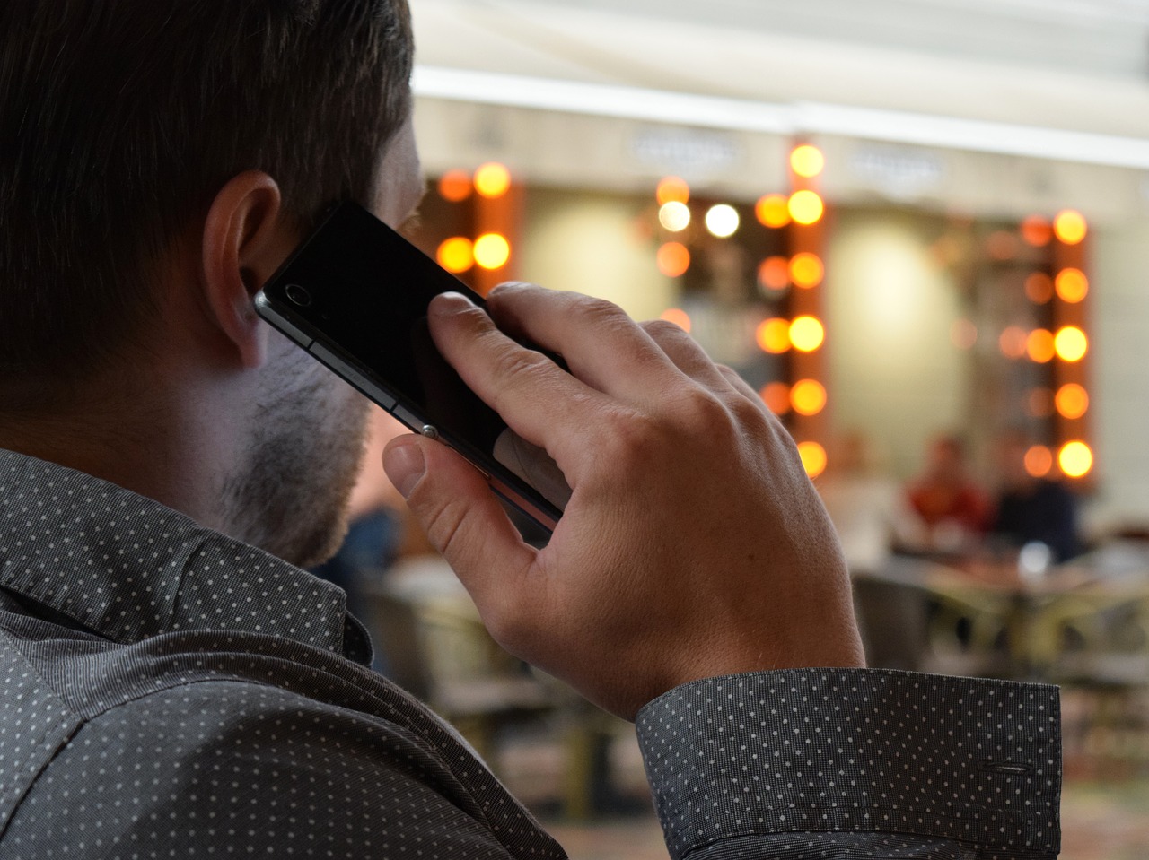 Image - man talking on the phone smartphone