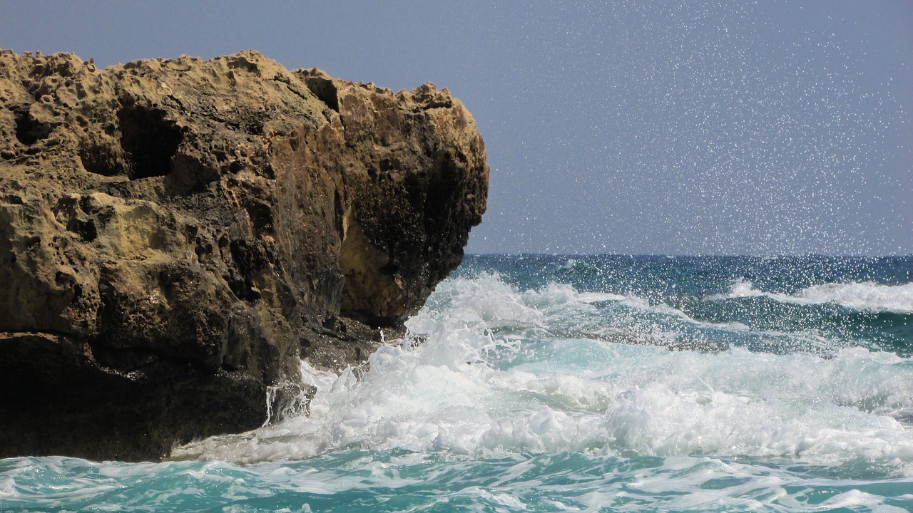 Image - rock wave smashing sea blue