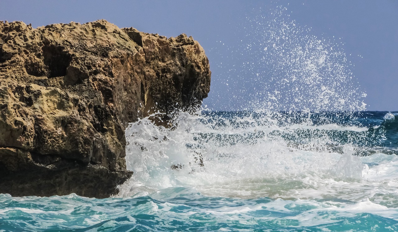 Image - rock wave smashing sea blue