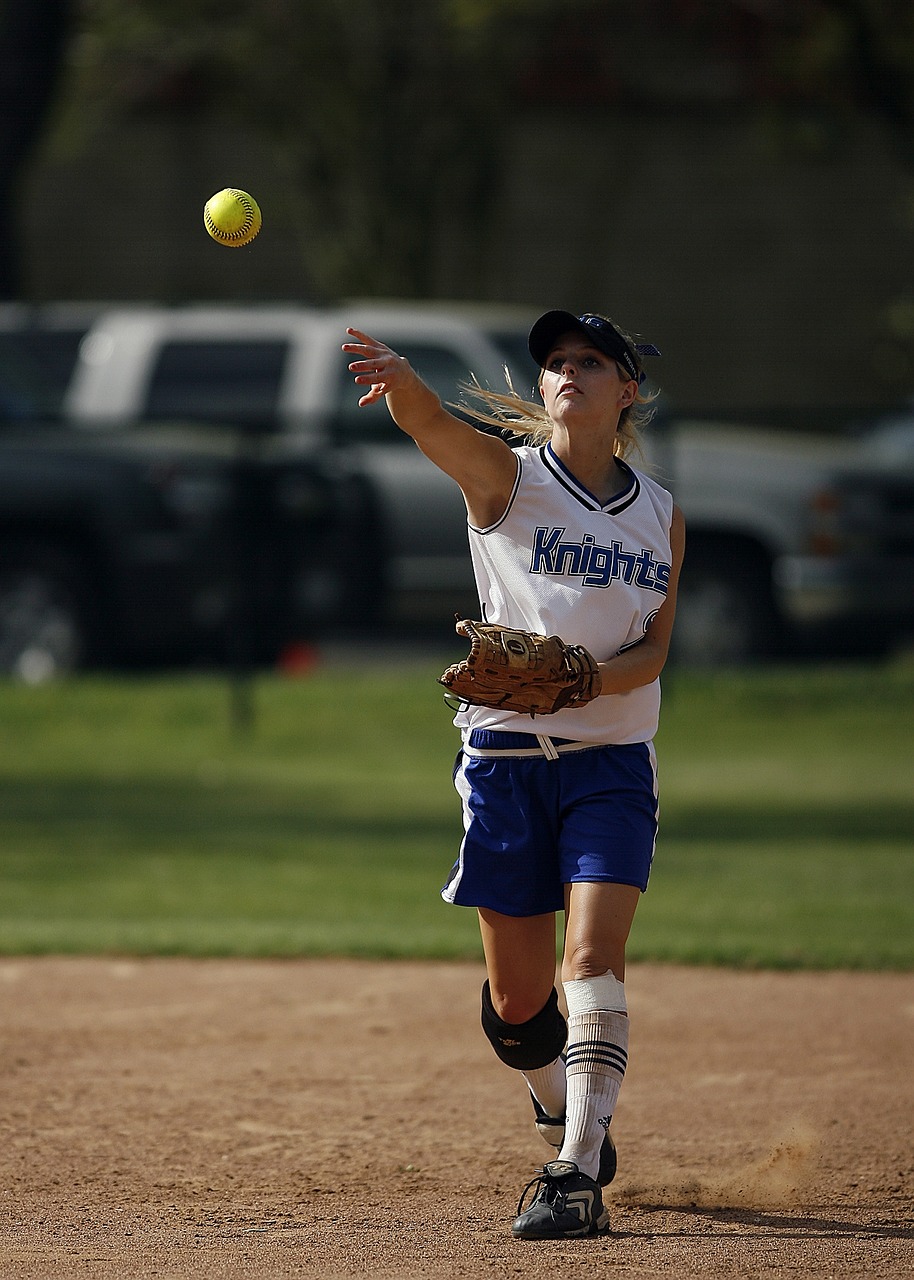 Image - softball player throwing ball game