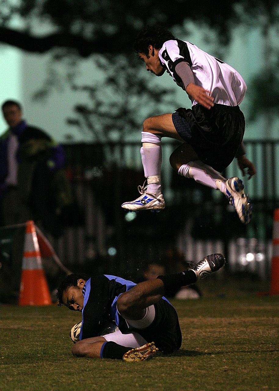 Image - soccer player jumping game action
