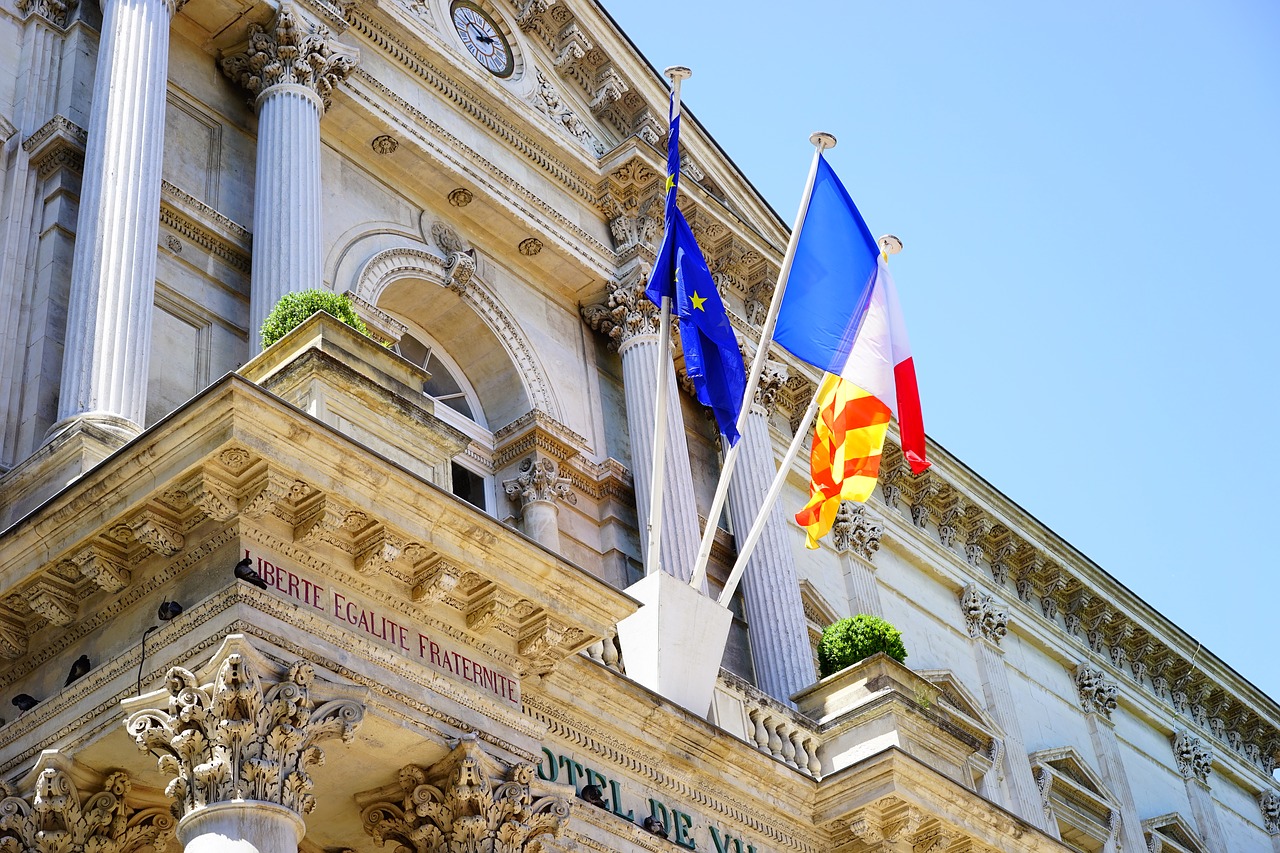 Image - flags town hall avignon facade