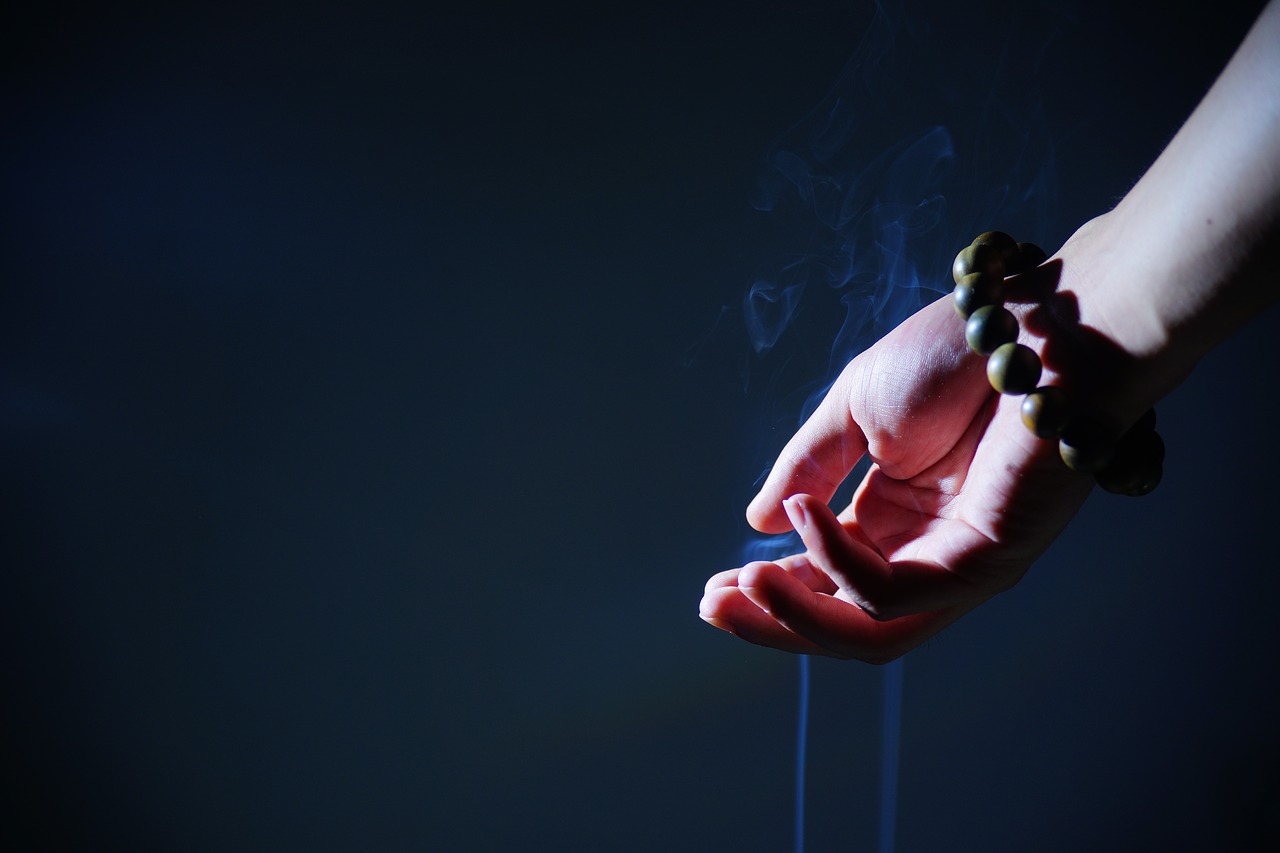 Image - hand buddhist prayer beads smoke