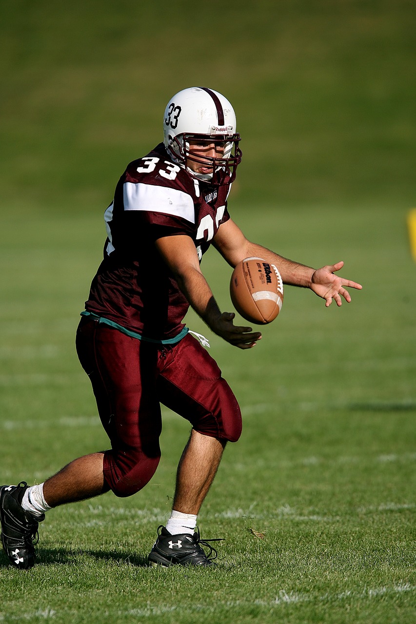 Image - football pitch player catch