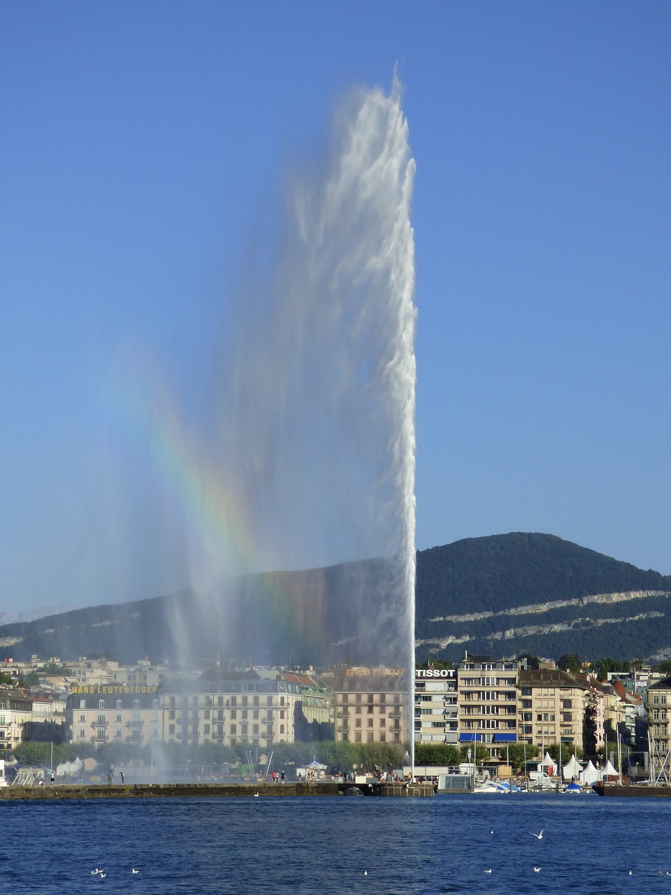 Image - water jet geneva lake rainbow