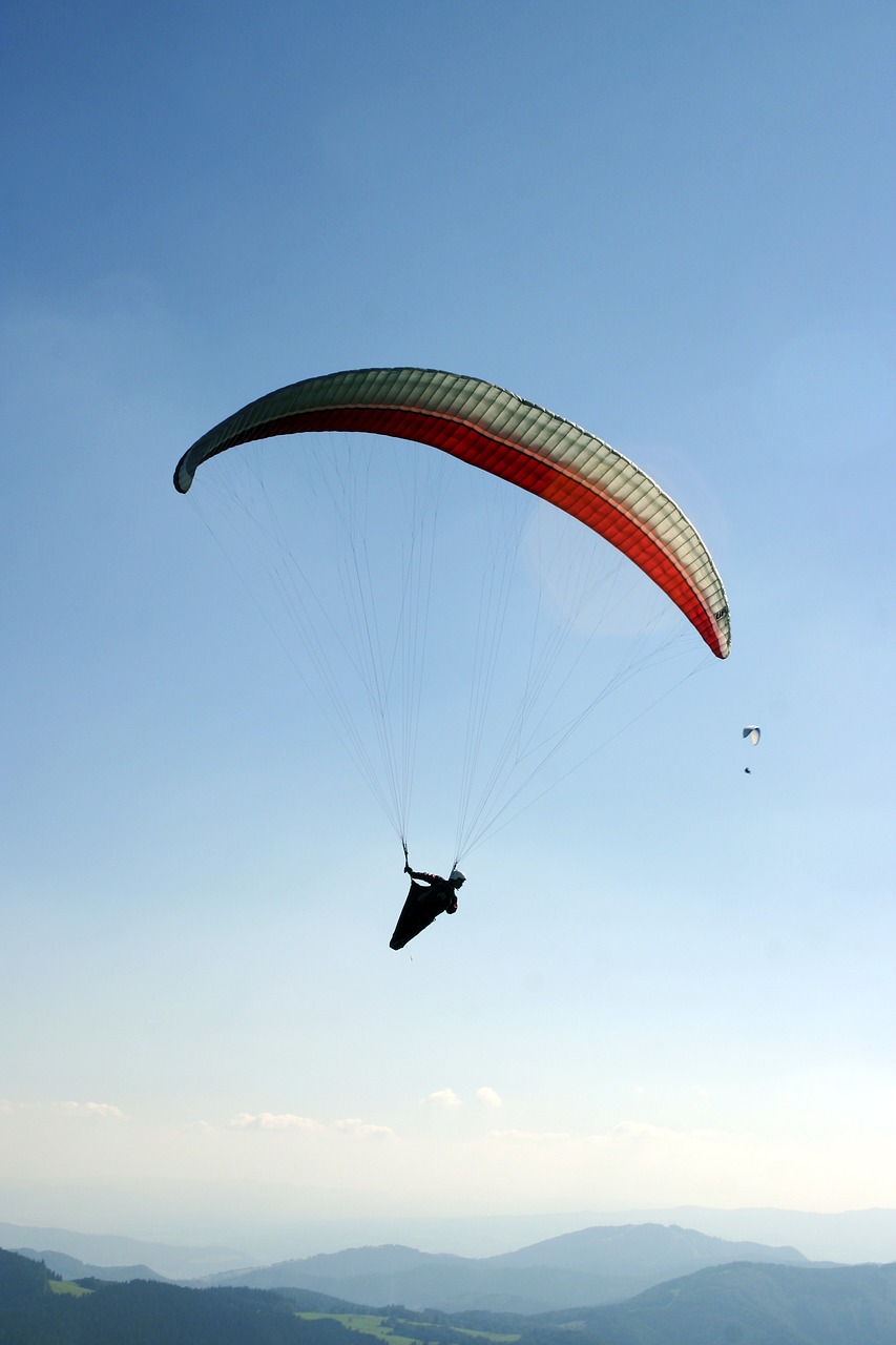 Image - paragliding a parachute the sky
