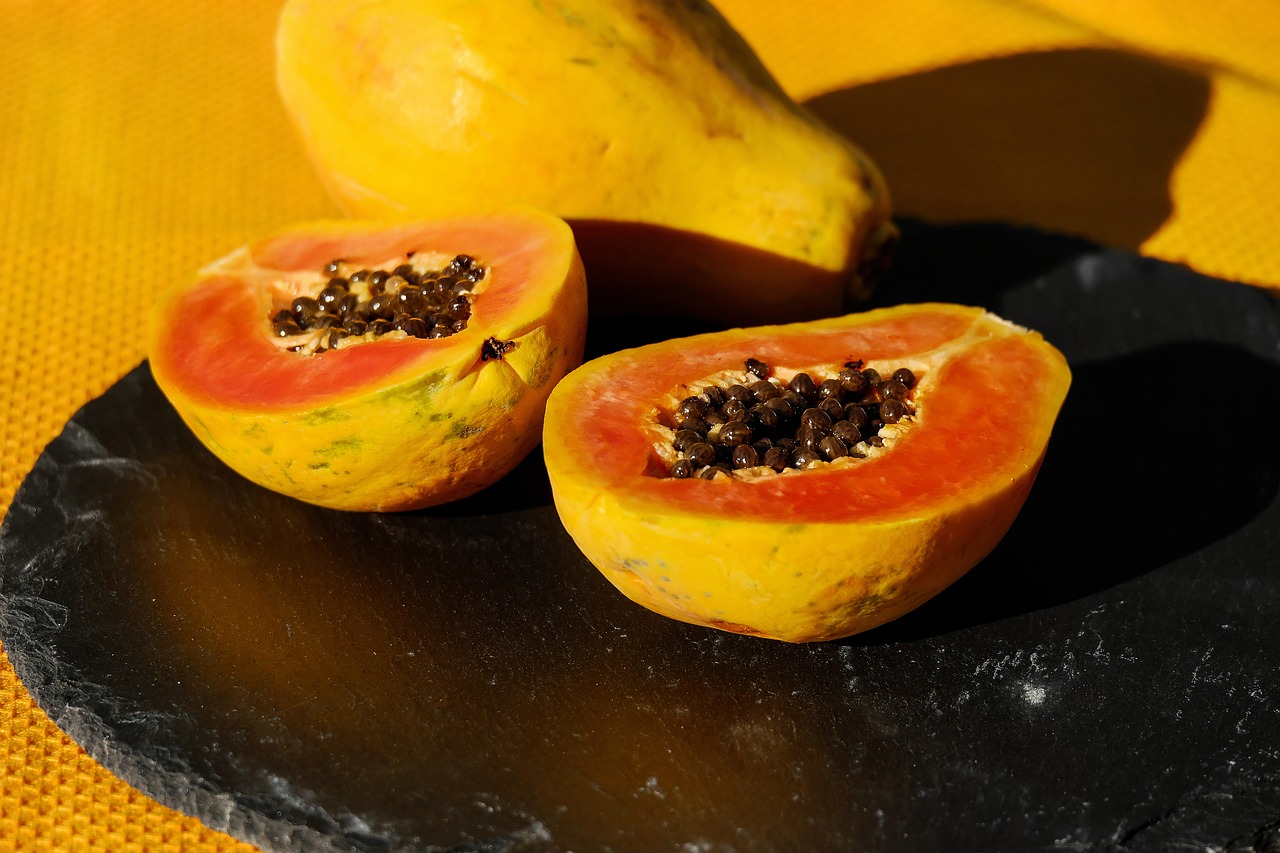 Image - papaya fruit cut in half cut