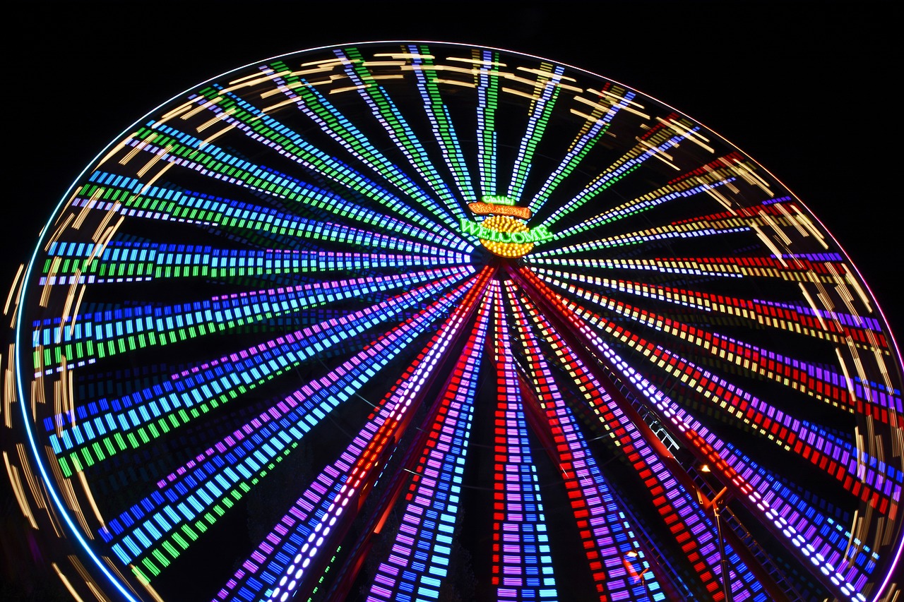 Image - ferris wheel fair hustle and bustle