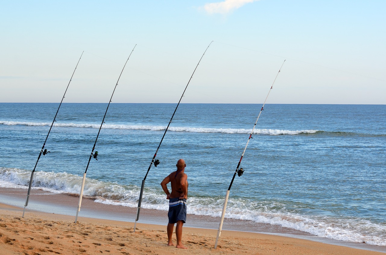 Image - surf fisherman fishing poles