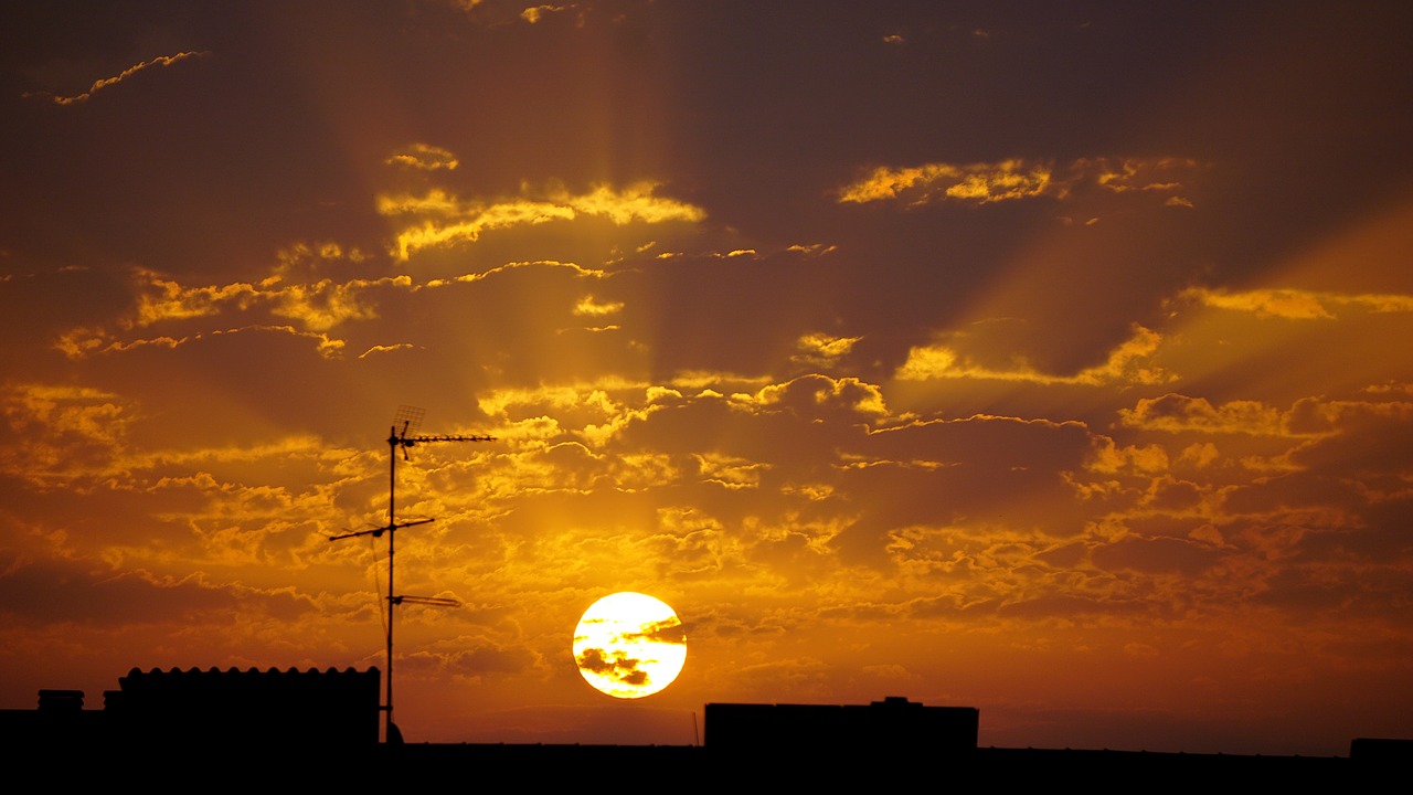 Image - dawn sun city clouds output sun