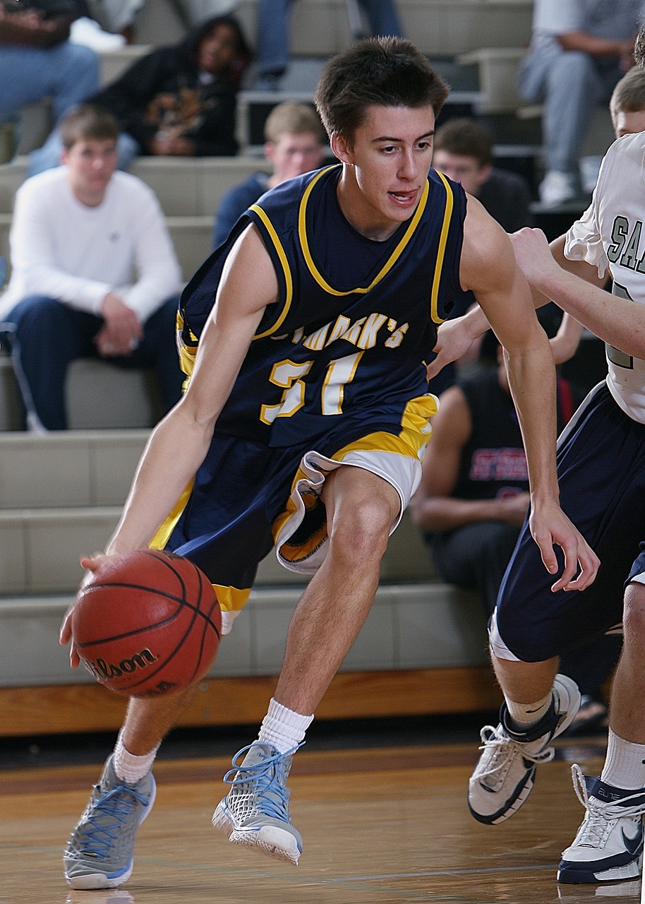 Image - basketball player dribbling ball