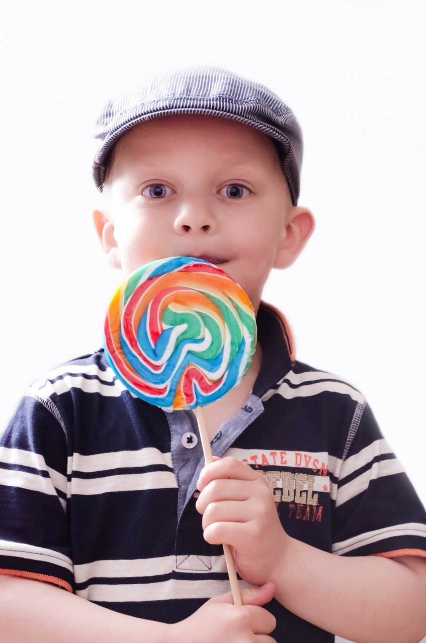 Image - child kid boy snack lollypops