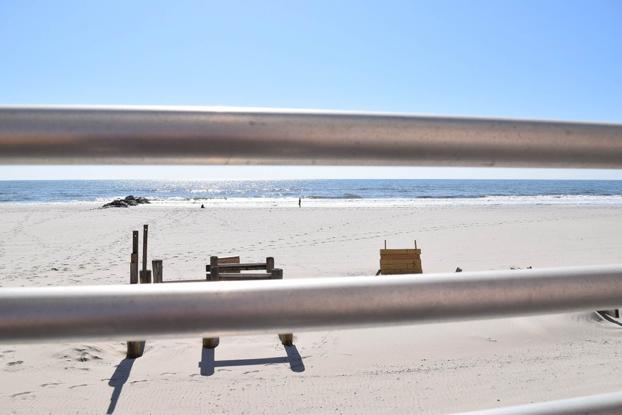 Image - beach banister long island sand
