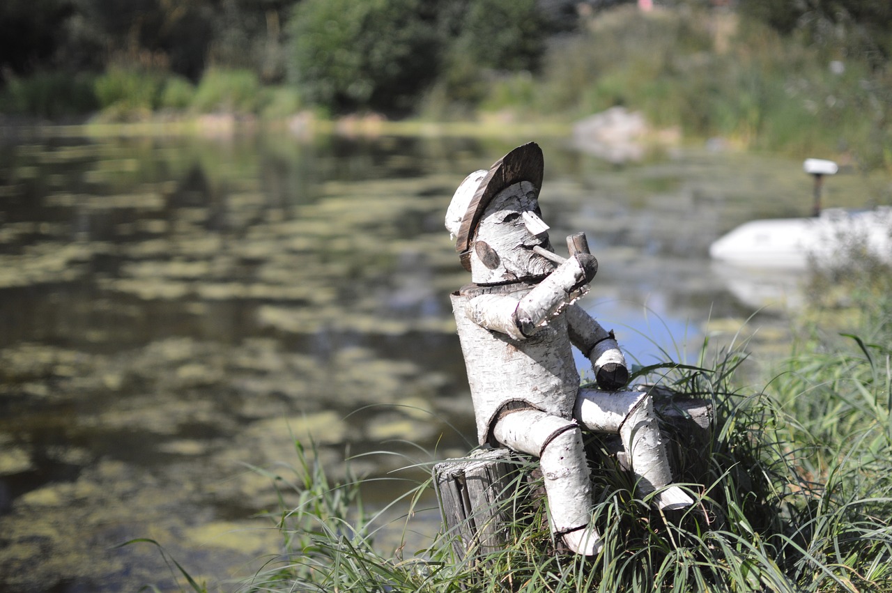 Image - little man wood doll water lake