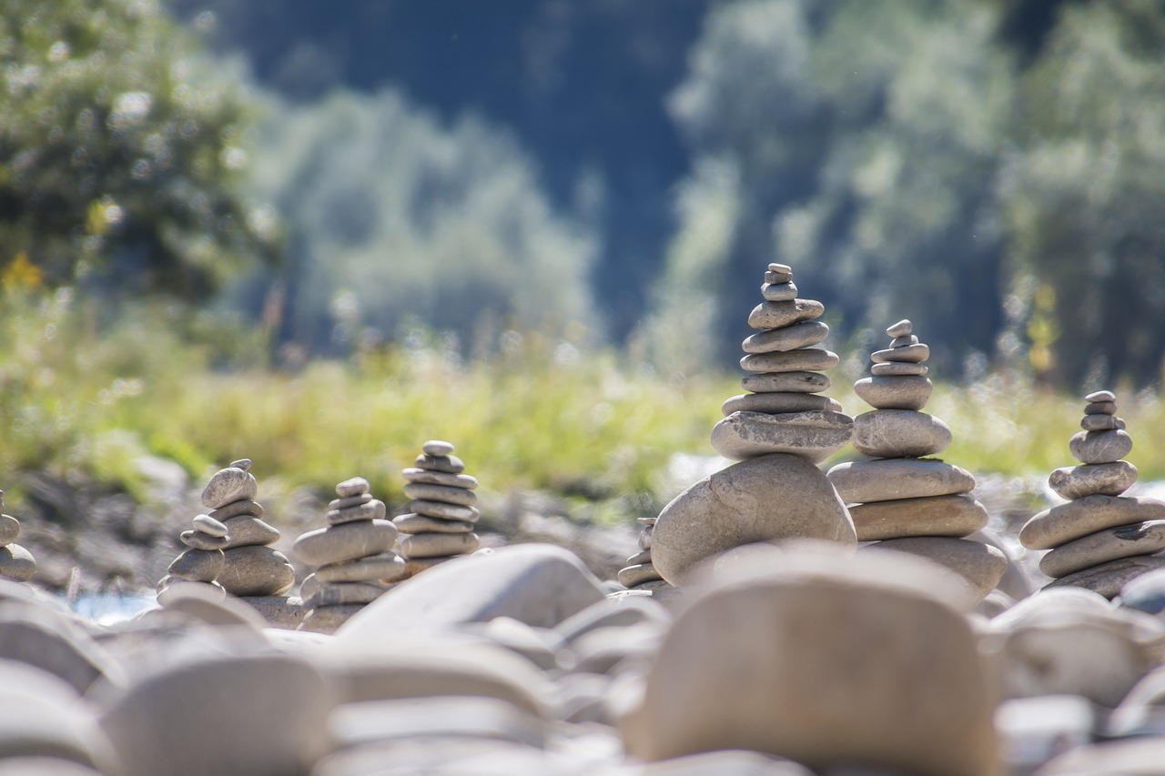 Image - stone sculpture cairn water nature