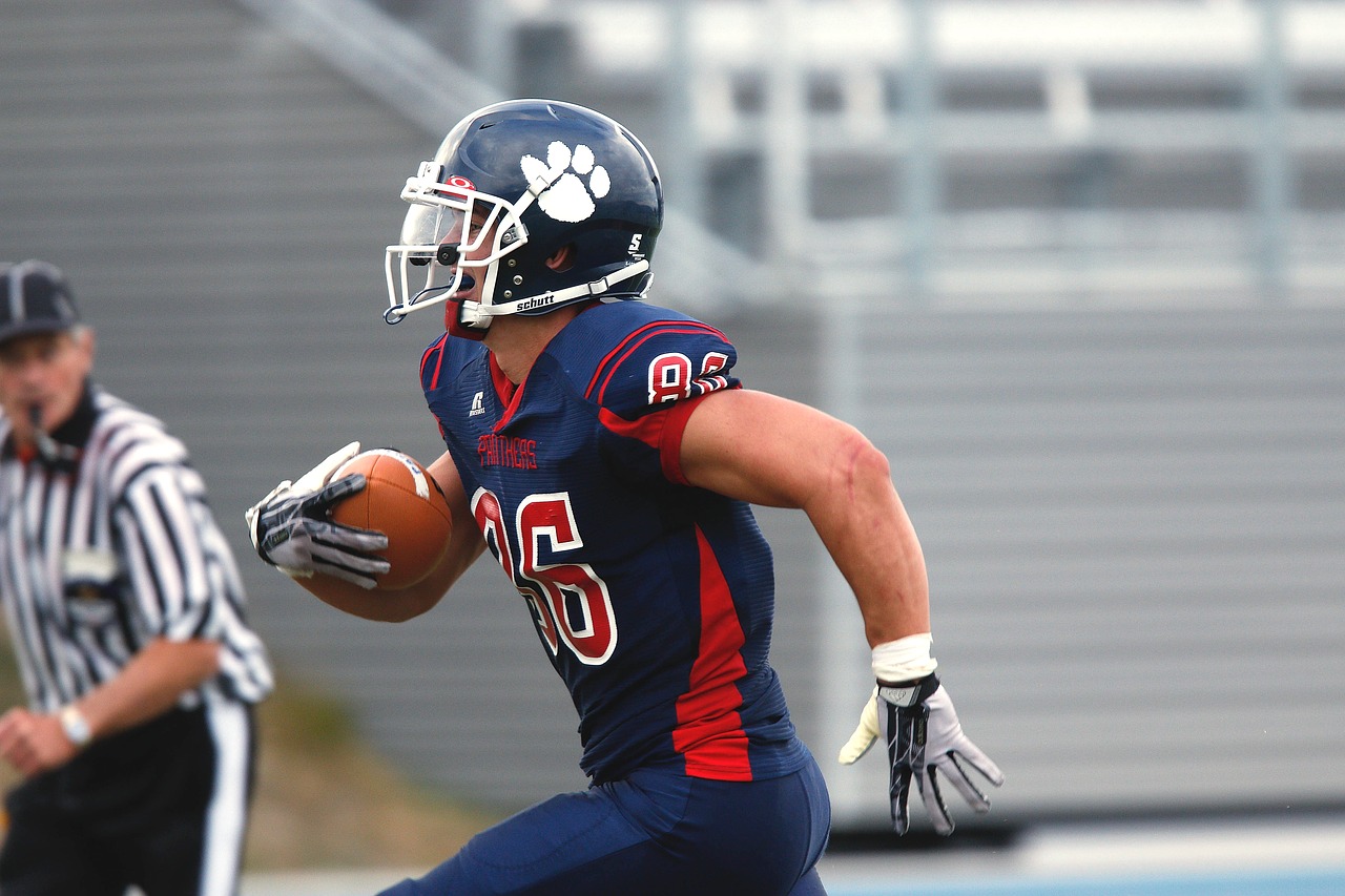 Image - football ball carrier running