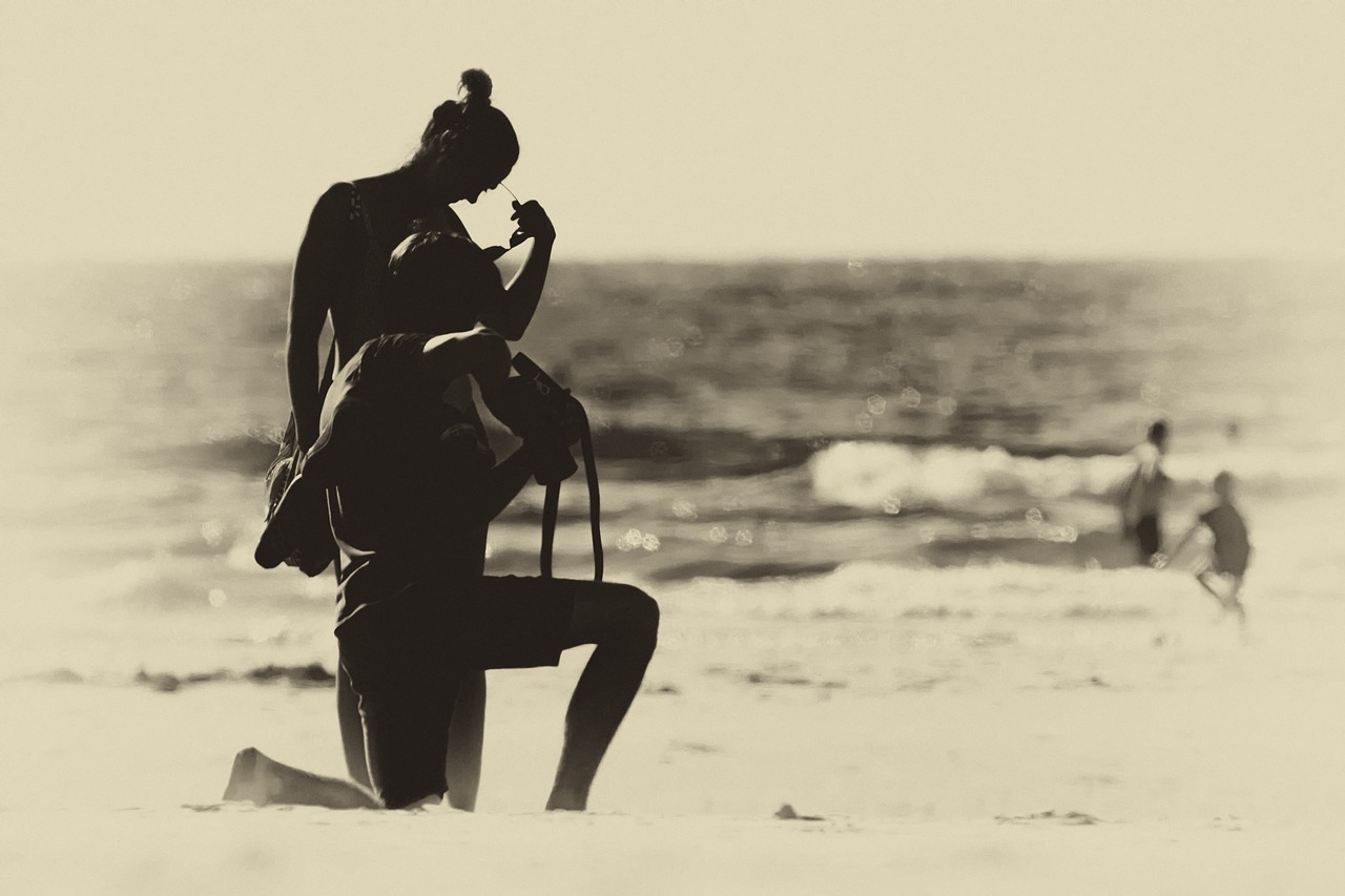 Image - photographer beach back light sepia