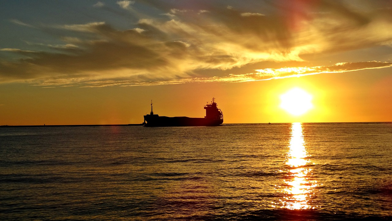 Image - sunset ship riga latvia sun clouds