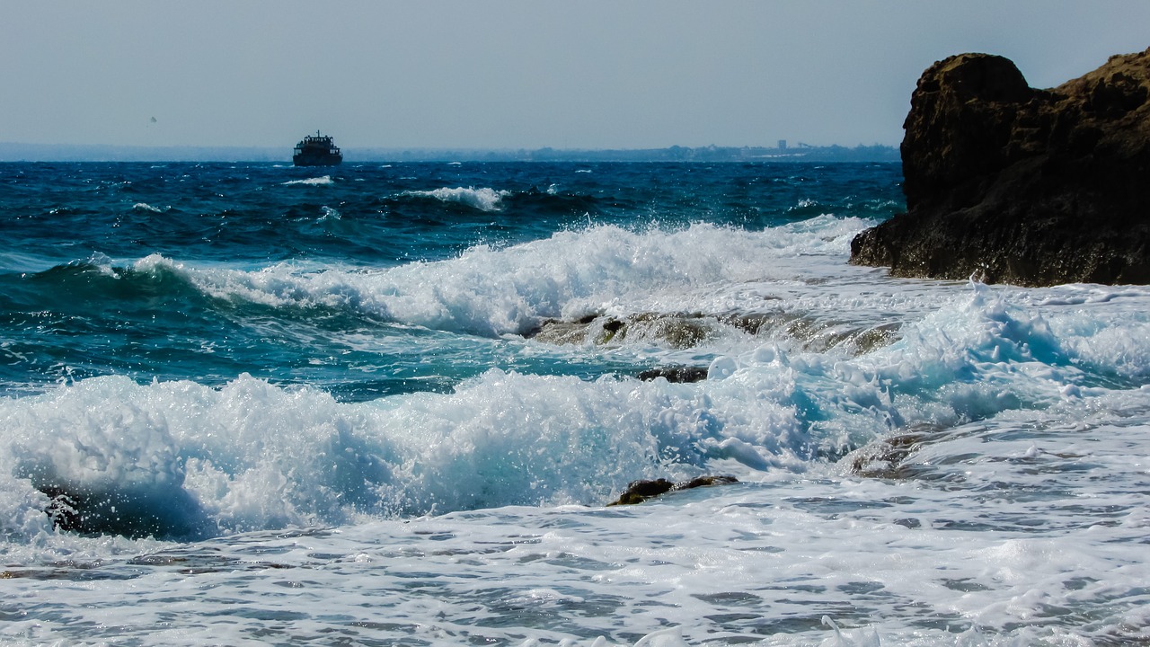 Image - wave smashing rocky coast autumn