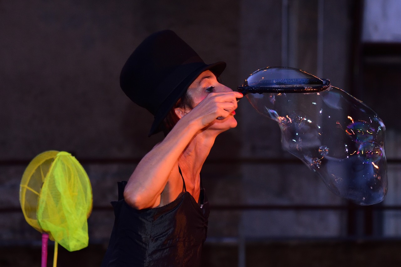 Image - soap bubbles show girl juggling