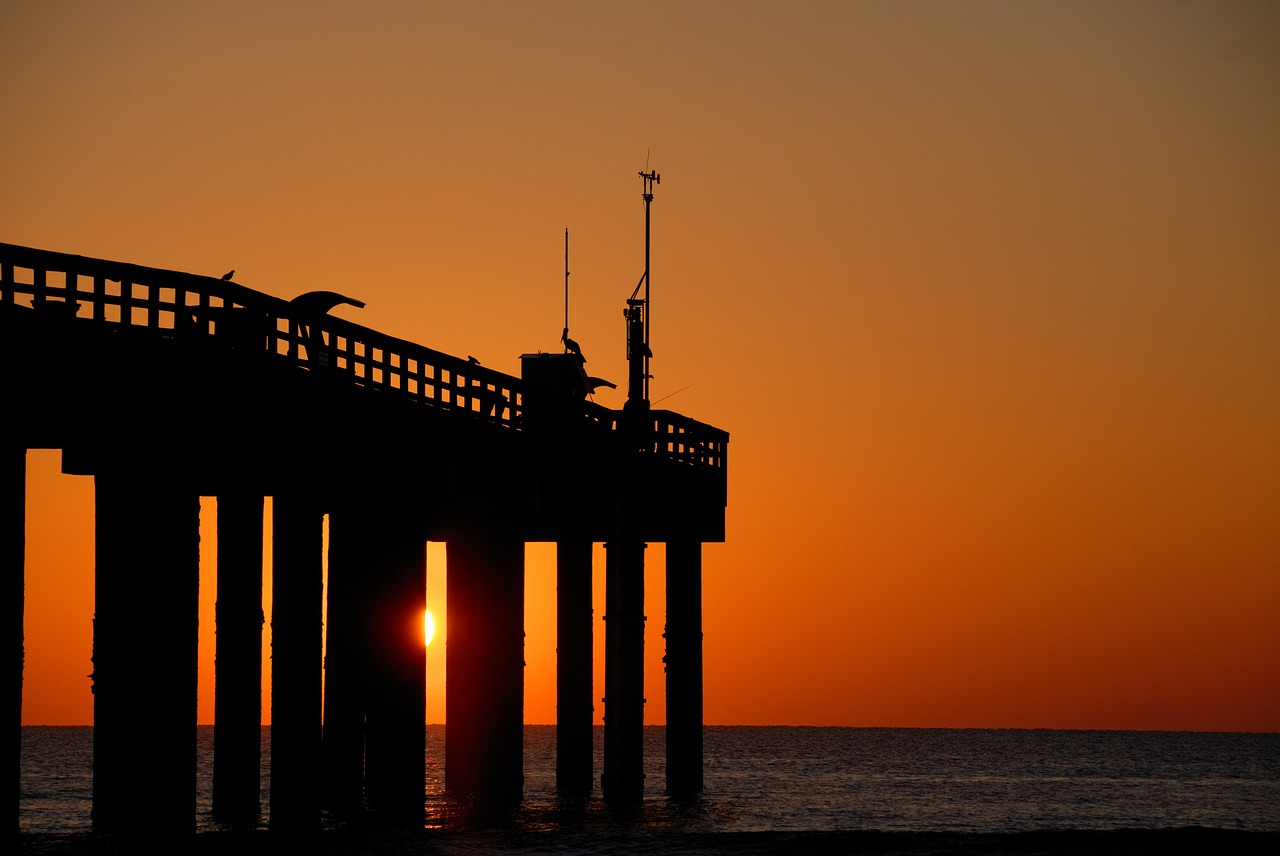Image - fishing pier sunrise orange sky