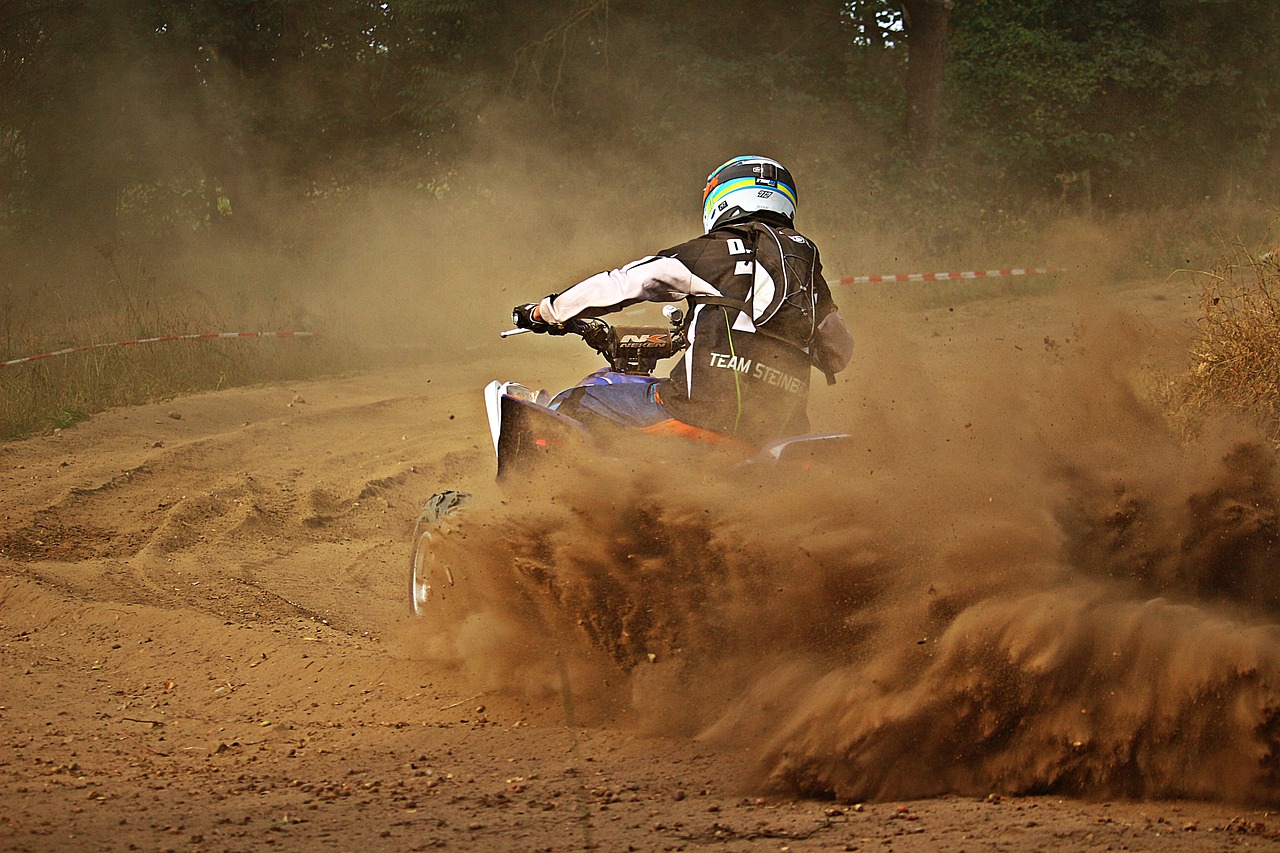 Image - quad cross dust sand race