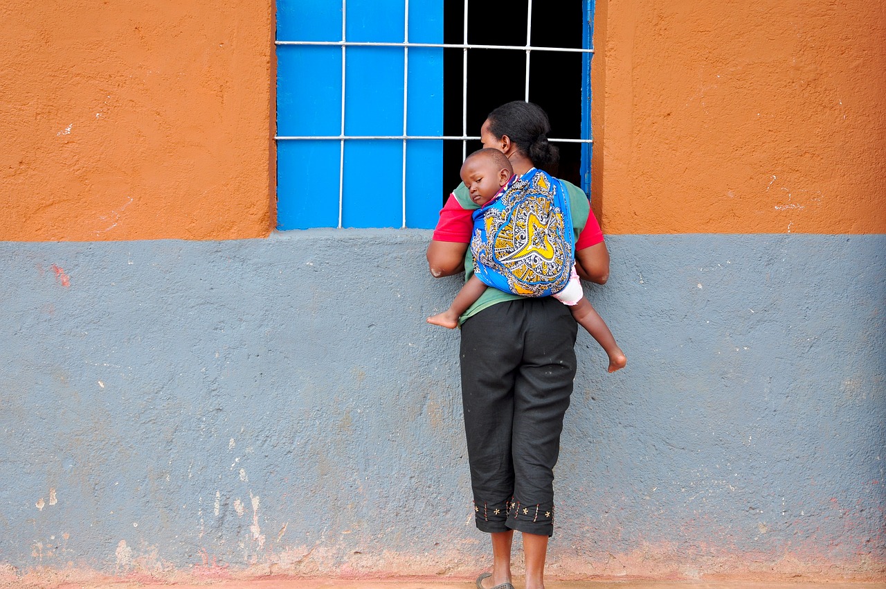 Image - mother child piggyback africa