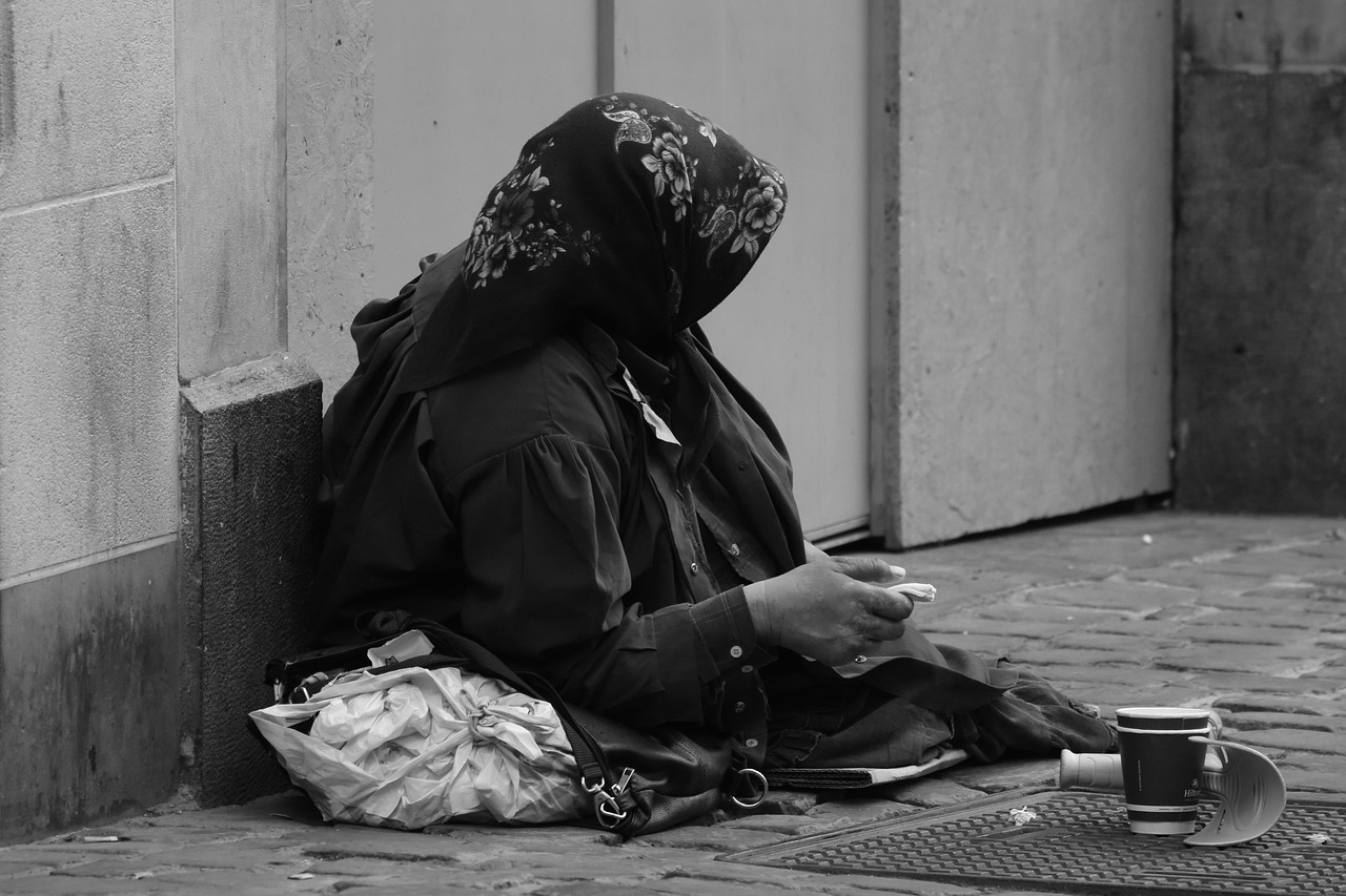 Image - begging woman poverty alms beggar