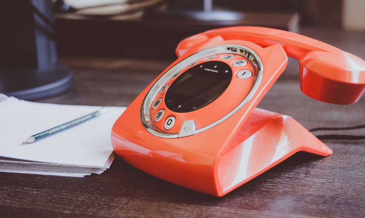 Image - phone desk orange workplace block