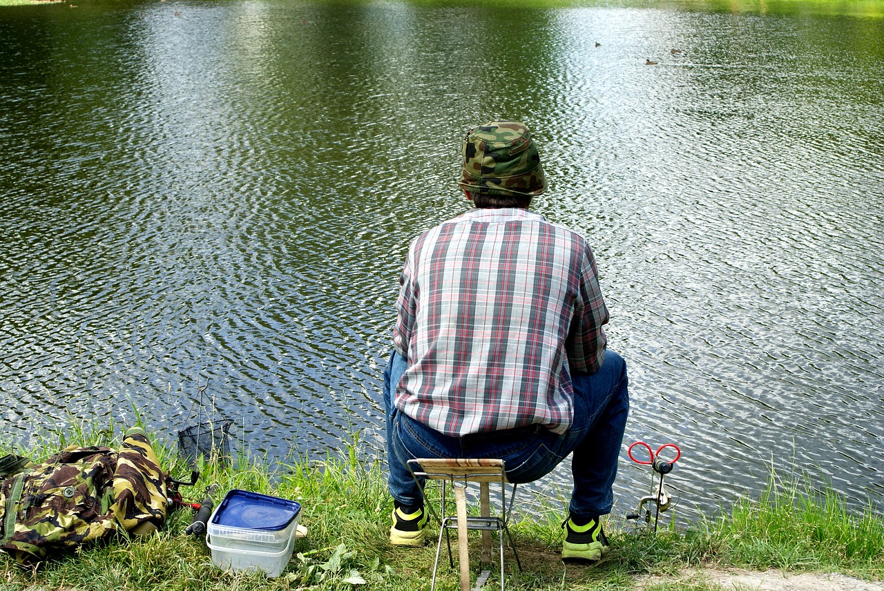 Image - fishing the fisherman male sitting