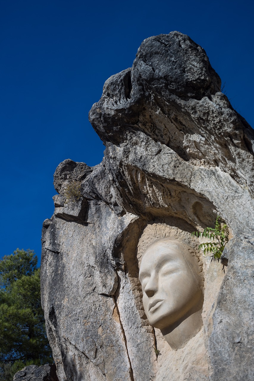 Image - faces sculpture stone buddha face