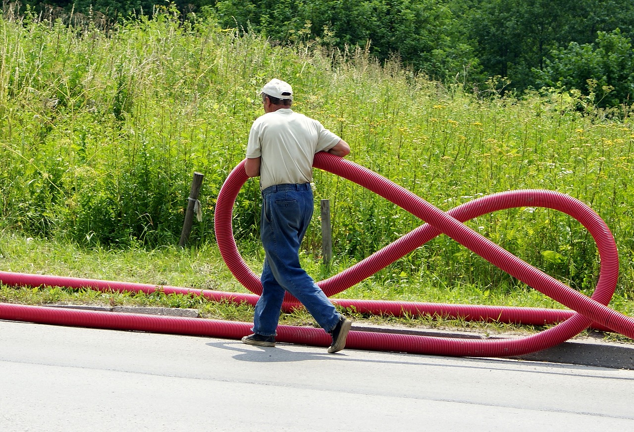 Image - employee worker work tube grass