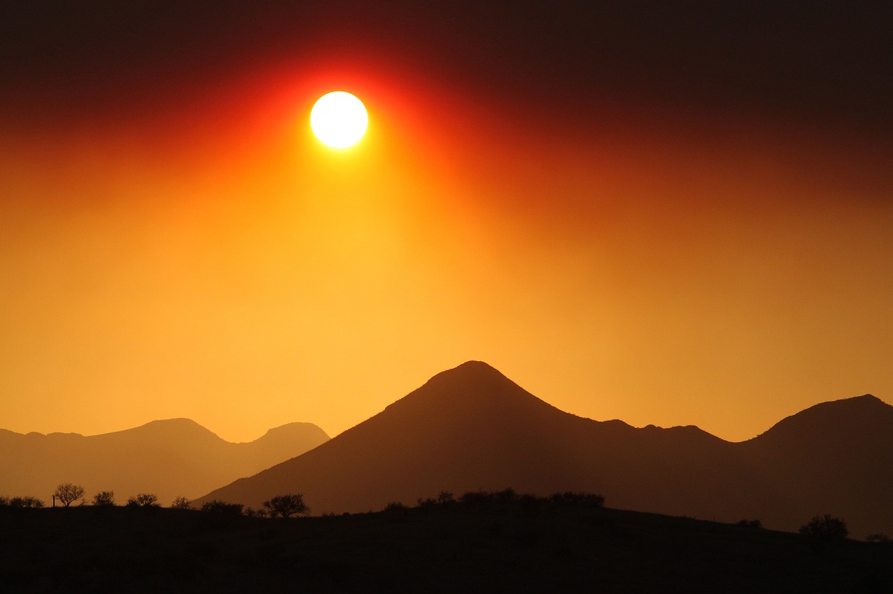 Image - sun smoke mountains silhouettes