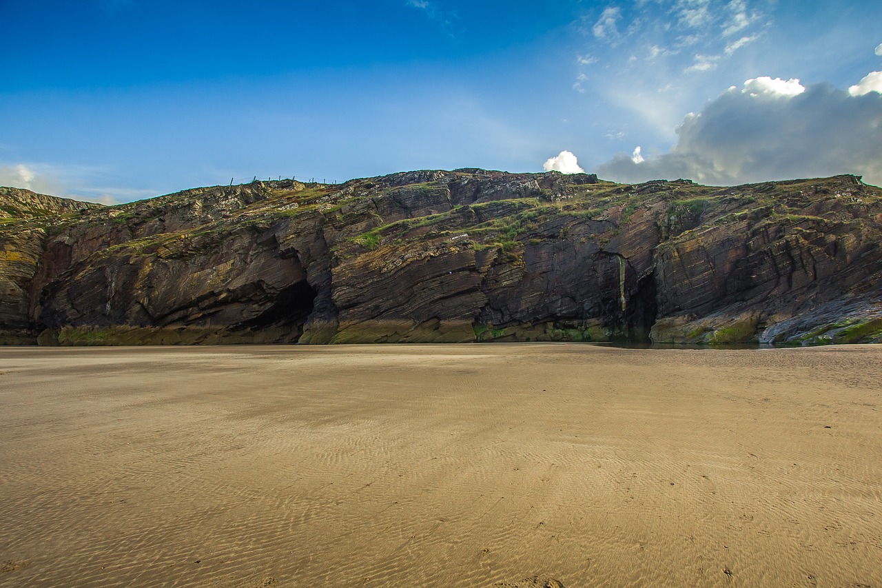 Image - cardigan bay cave beach low tide