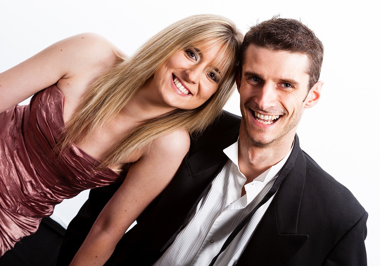 Image - couple smiling formal black tie